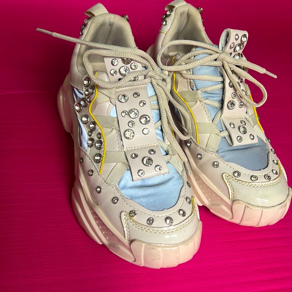 Chunky sneakers with crystals.